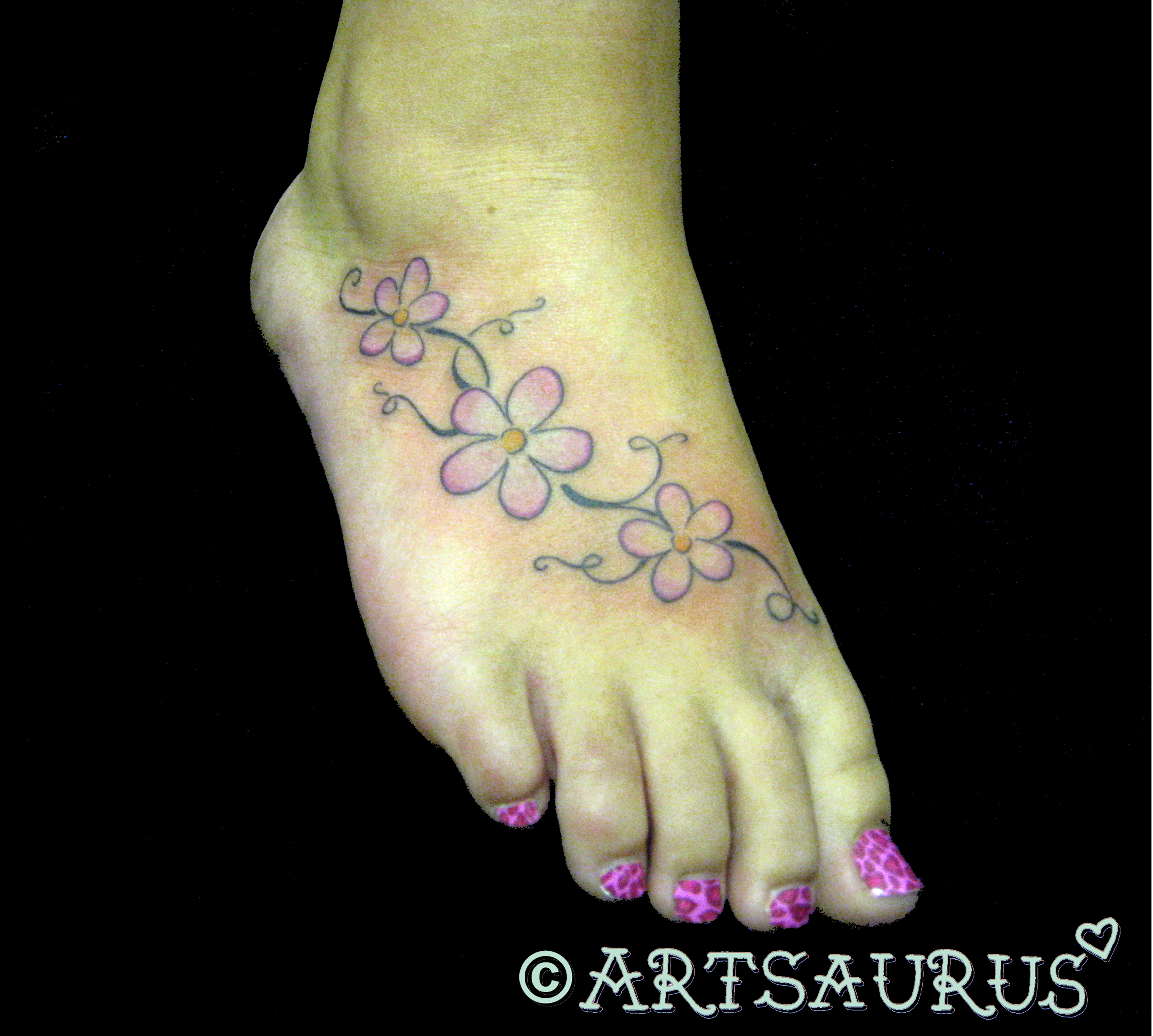 photos of vine foot tattoos
